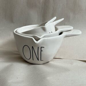 White Rae dunn handled measuring cups